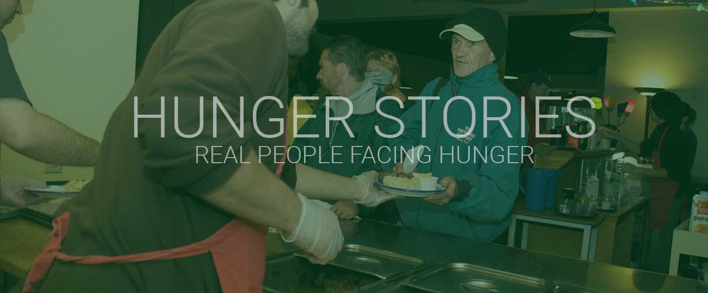 a person receives a meal over a counter. text reads hunger stories real people facing hunger